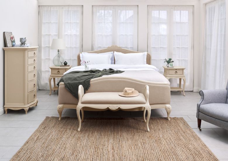 Ivory distressed upholstered king size upholstered bedframe available at Lee Longlands