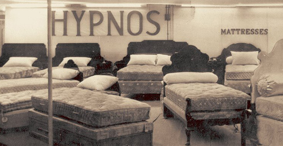 ABOUT HYPNOS
For over 120 years, Hypnos has been perfecting the art of making mattresses and beds by hand. Still family run today, the British manufacturer has passed its traditional skills and expertise down through five generations.
Handcrafted in Buckinghamshire, every Hypnos bed reflects a commitment to British craftsmanship, considered design and exceptional comfort. Master craftspeople combine time honoured techniques with modern innovation, creating deep pocket spring mattresses and beautifully made beds designed to provide a truly restful night's sleep.
Hypnos is also committed to making its products in a more sustainable way. Natural and sustainable materials are carefully selected for their comfort, durability and performance, while the business continues to work towards its goal of becoming net zero by 2040.