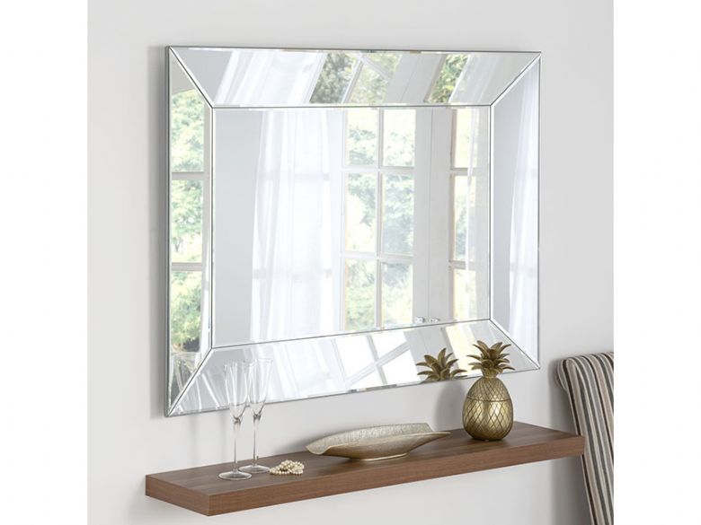 Angled all glass modern mirror at Lee Longlands
