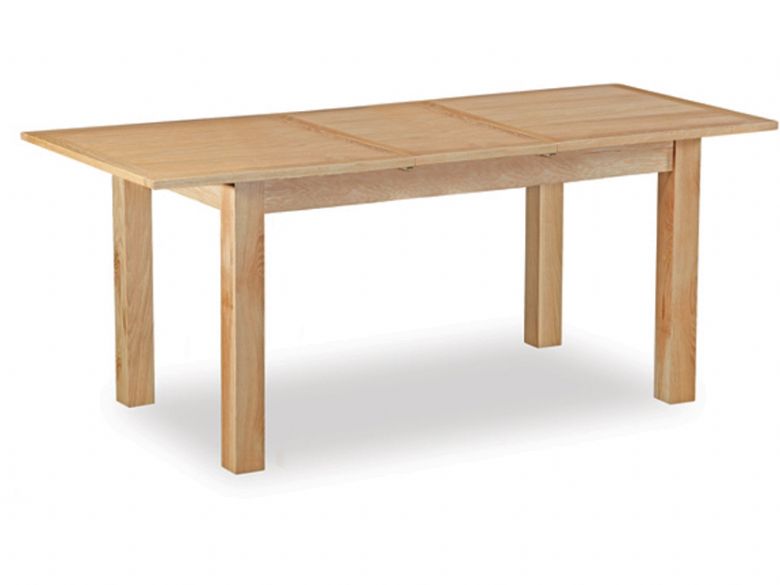Compact extending dining table