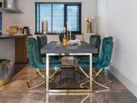 Savoy gold dining table and Fitzrovia dining chair