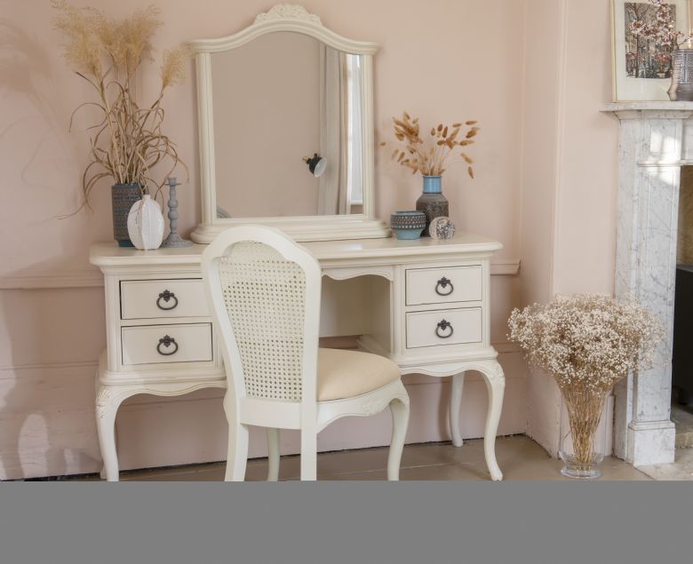 Ivory distressed bedroom furniture including rattan pieces