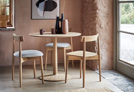 Ercol Siena Round Dining Table and Two Chairs
