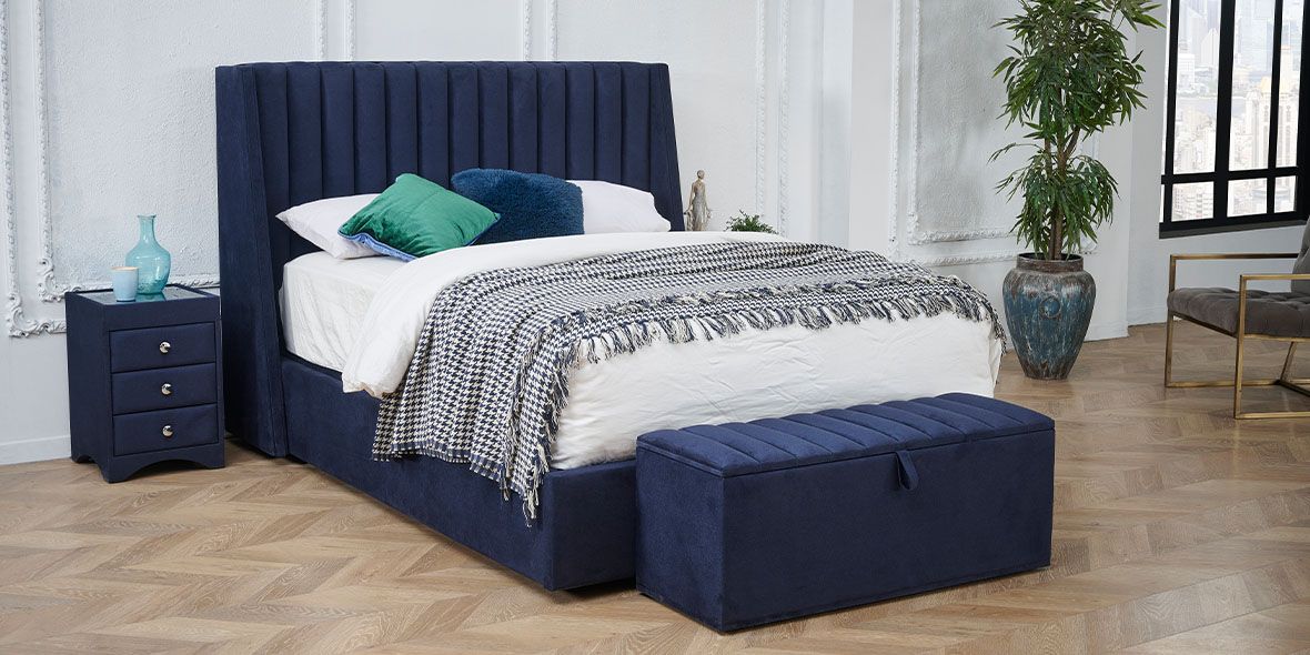 Lifestyle image of Camerino Ottoman bed in blue